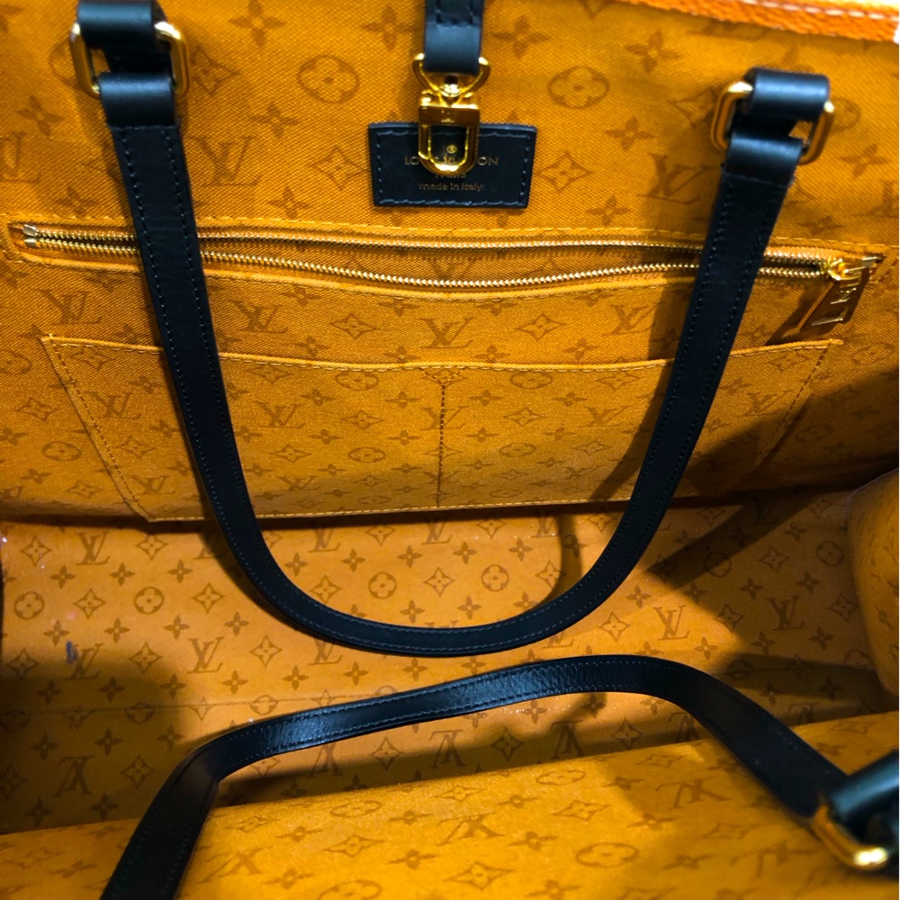 Louis Vuitton crafty on the go bag